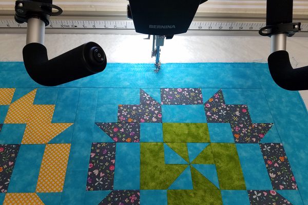 Straight Line Quilting with Q-matic, begin stitching