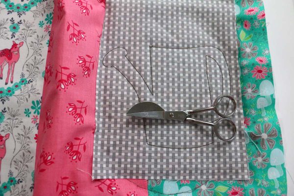 Step 6, Embroidering the Hello Spring Embroidered Pillow 