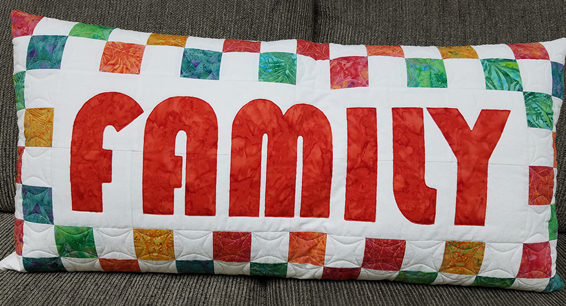Raw edge appliqué pillow