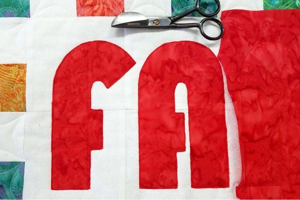 Raw edge appliqué pillow