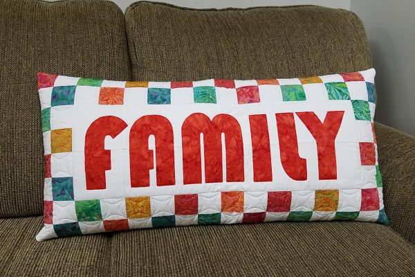 Raw edge appliqué pillow
