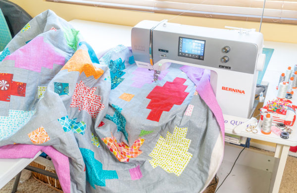 Scrunching the quilt under the machine
