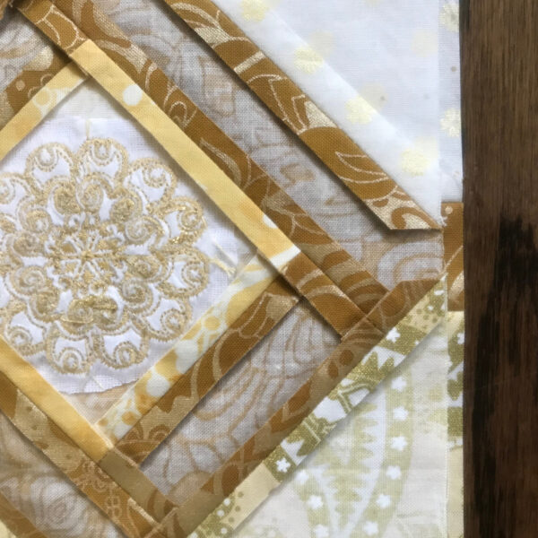 https://dhoubxhx.top/wp-content/uploads/sites/4/2018/12/125thAnniversaryQuilt_Month_5_Aligning_the_frame_work
