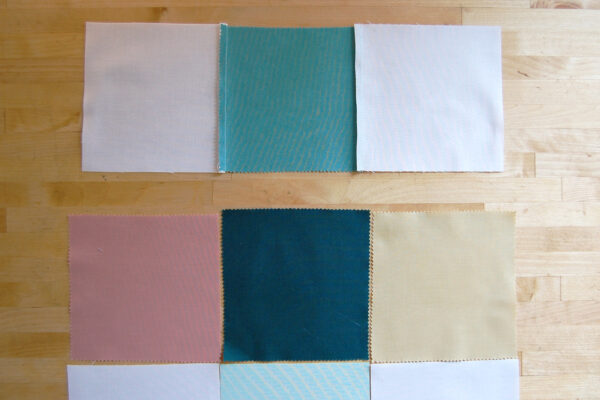 Minki Backed Patchwork Baby Quilt tutorial at WeAllSew
