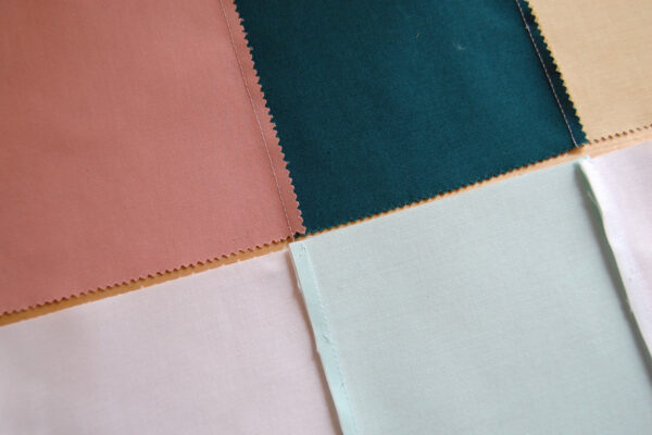 Minki Backed Patchwork Baby Quilt tutorial at WeAllSew
