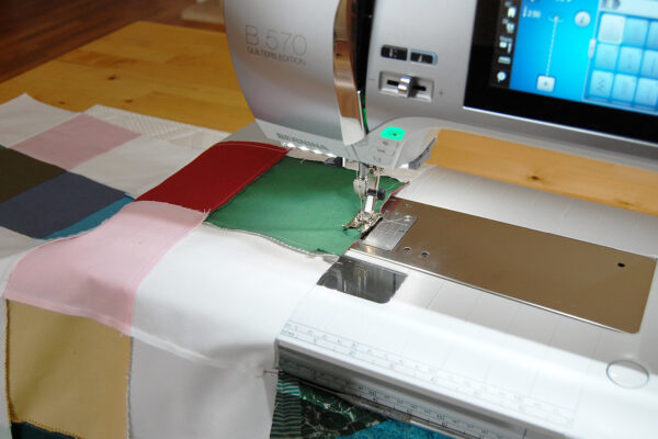 Minki Backed Patchwork Baby Quilt tutorial at WeAllSew