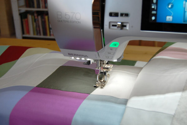 Minki Backed Patchwork Baby Quilt tutorial at WeAllSew