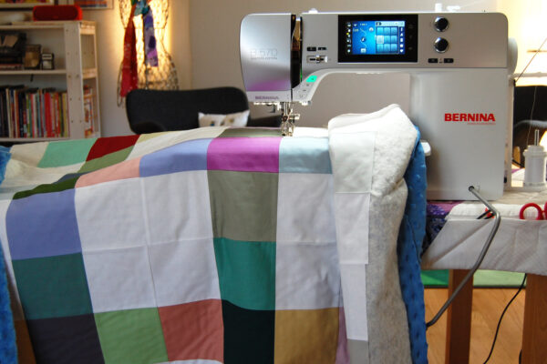 Minki Backed Patchwork Baby Quilt tutorial at WeAllSew