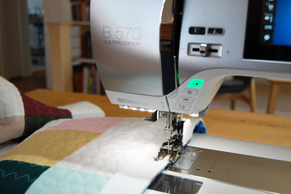Minki Backed Patchwork Baby Quilt tutorial at WeAllSew