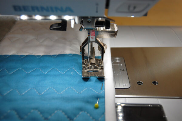 Minki Backed Patchwork Baby Quilt tutorial at WeAllSew