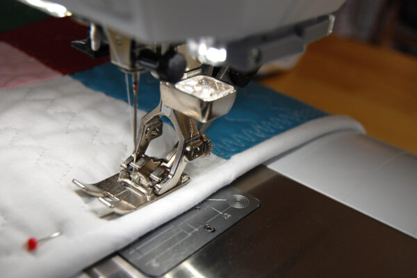 Minki Backed Patchwork Baby Quilt tutorial at WeAllSew