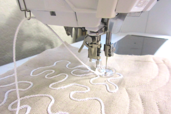 guide on the side of the machine