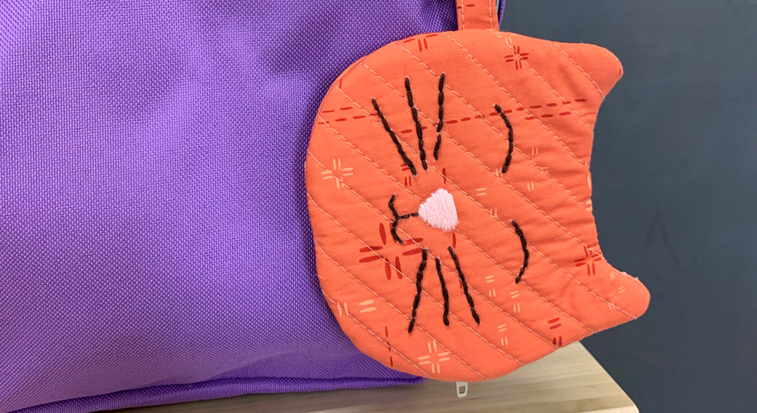 Cat zipper pouch tutorial from WeAllSew