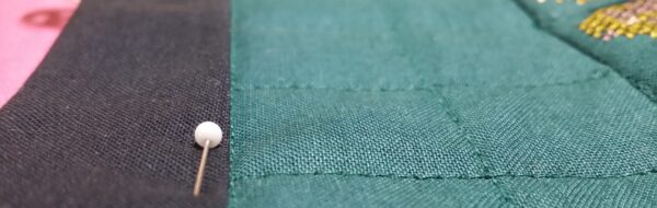 Quilt self-binding using the backing fabric
