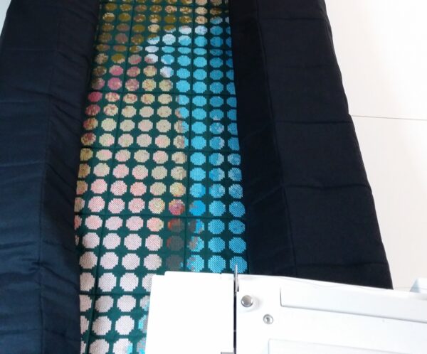 Rolled up quilt for quilting stitch