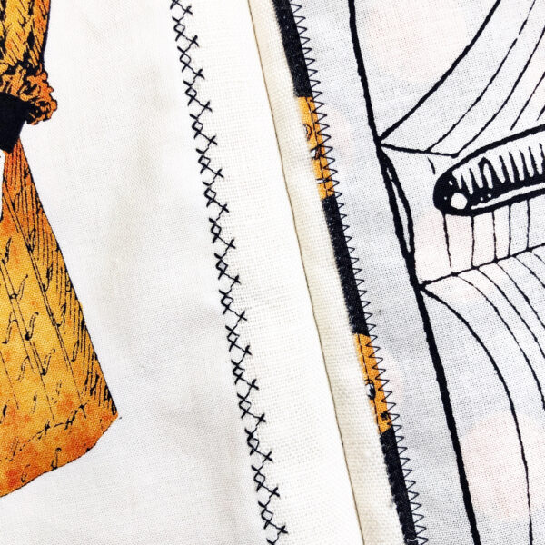 Halloween Scary Book: Sew the panels on the inside pages