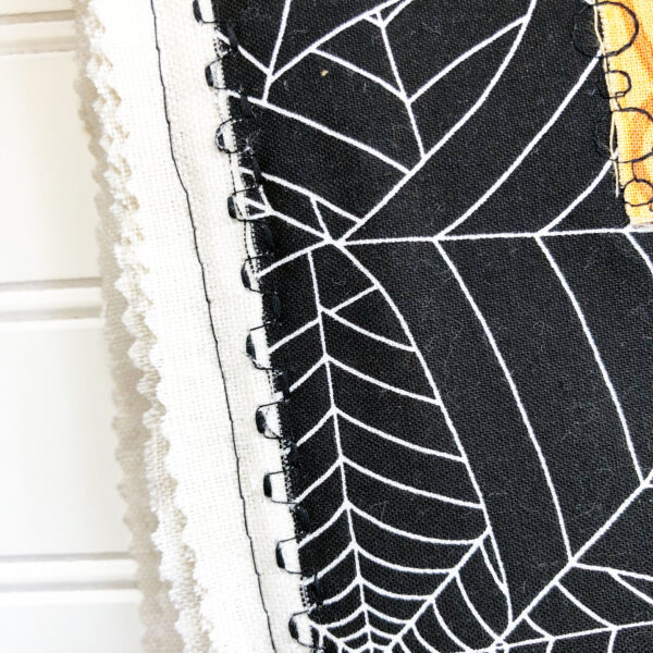 Halloween Scary Book: Sew the panels on the book cover