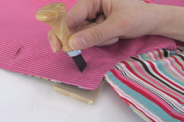 Buttonhole cutter in action