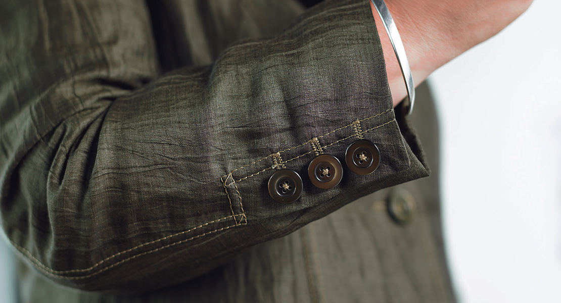 jacket with buttonholes on sleeve