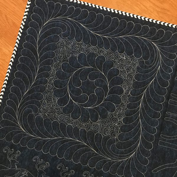 Volume 1 designs, with free-motioned open paisleys or petals