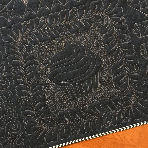Volume 11 designs, with free-motioned paisley