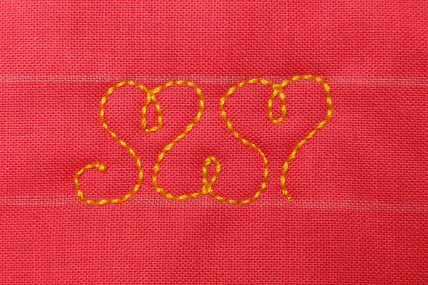 Free Motion Quilt Hearts in a Border - Two loopy hearts