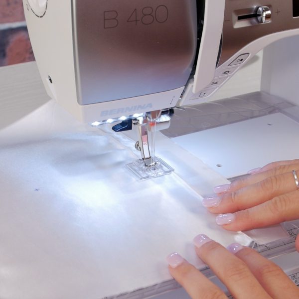 MTC_Ring_Bearer_Pillow_09_Aligning_Pintuck_in_groove_of_foot_BERNINA_WeAllSew_Blog_1080x1080px