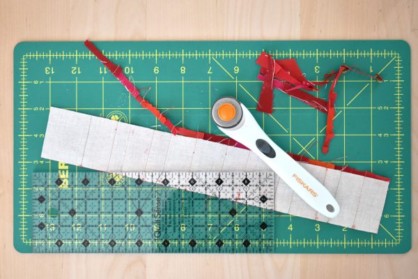 Then repeat the above steps until the foundation strip of muslin is completely covered by the scraps of fabric.