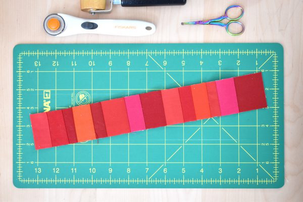 Then repeat the above steps until the foundation strip of muslin is completely covered by the scraps of fabric.