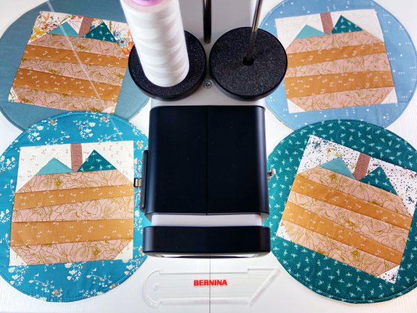 How to Piece and Quilt Insulated Pumpkin Placemats BERNINA WeAllSew Blog 600 x 450