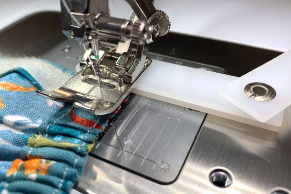 Use a height compensating tool at top of the dress