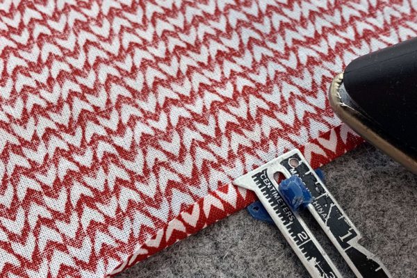 Press 1/4" to wrong side on ruffle hem