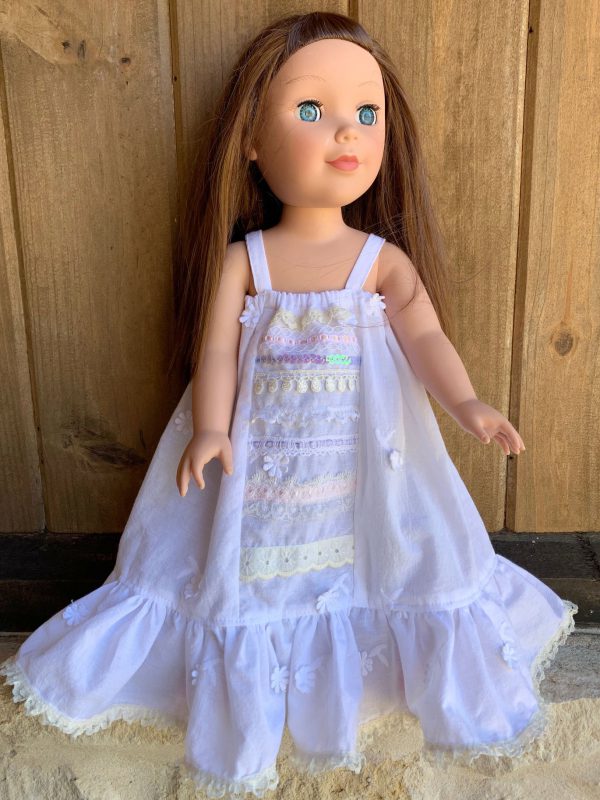 White eyelet maxi dress with multiple trims