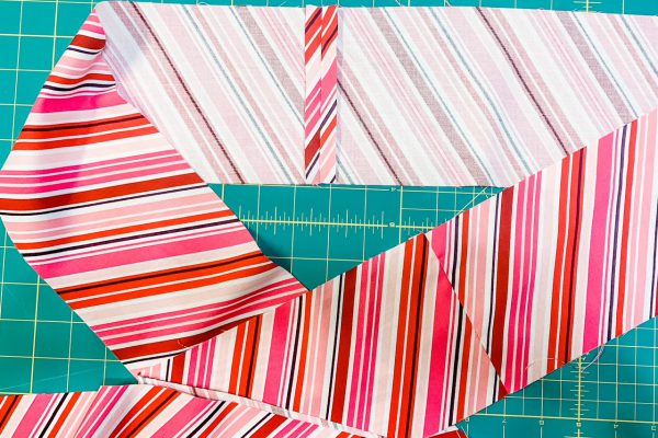Stitch tie ends to the apron waistband