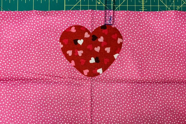 Center first heart on apron bottom band