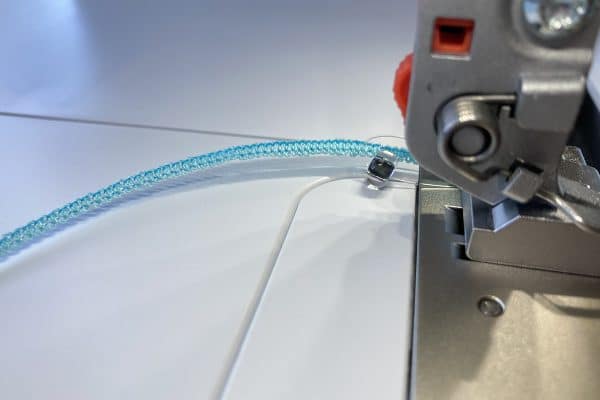 Overlocker_Jewelry_08_Bead_and_loop_behind_foot_BERNINA_WeAllSew_Blog_1200x800px