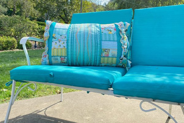Create a Pillow with a Serger - Serger_Sampler_Pillow_17_outside_couch_2_BERNINA_WeAllSew_Blog_1200x800px