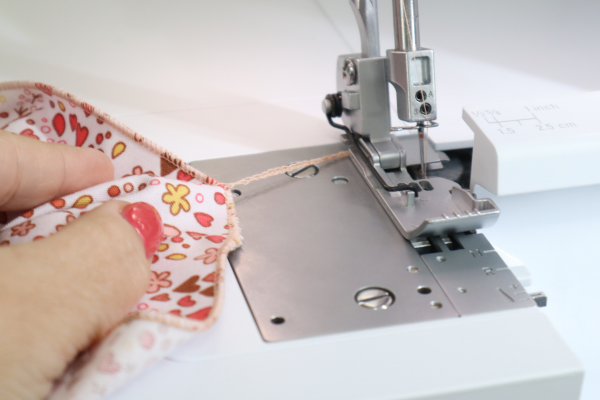 raised foot and thread pull