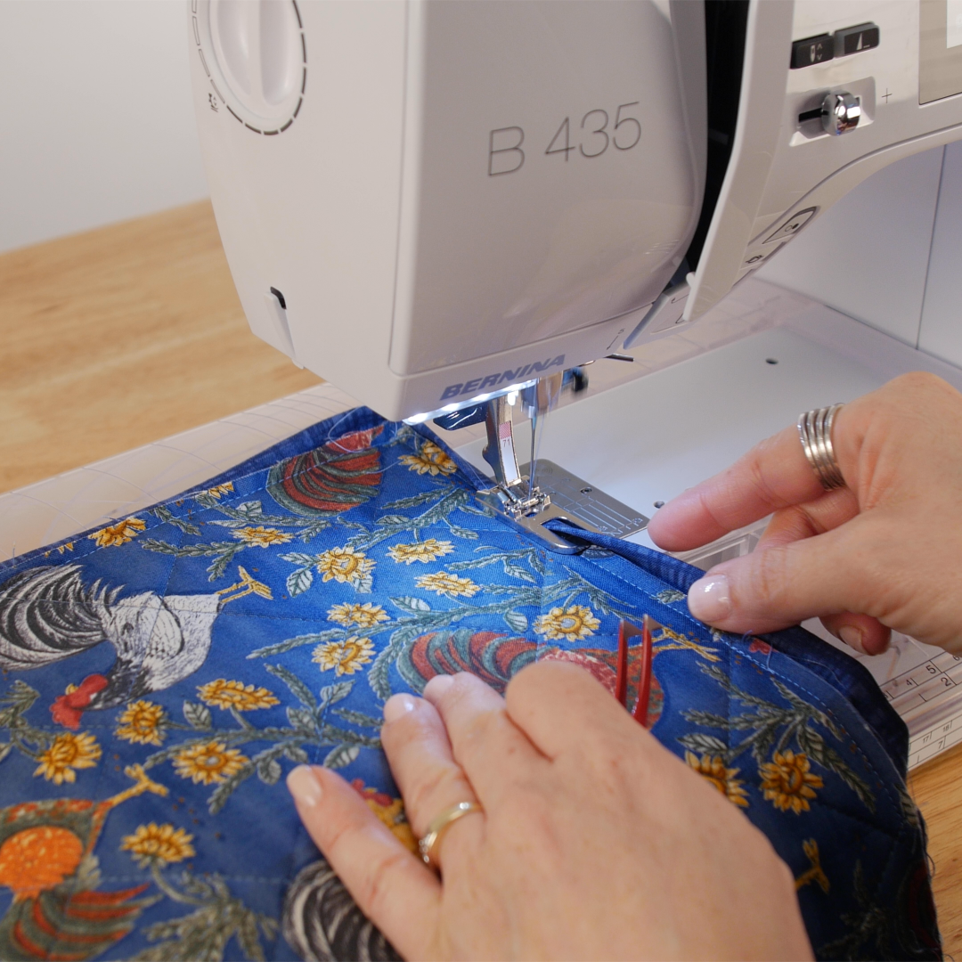 Lap_Seam_Bindfing_14_Place_Binding_in_Foot_BERNINA_WeAllSew_Blog_1080x1080px