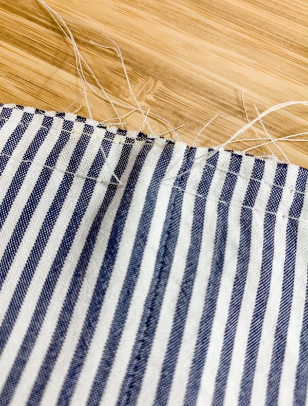Close up of gathering stitches on ruffle