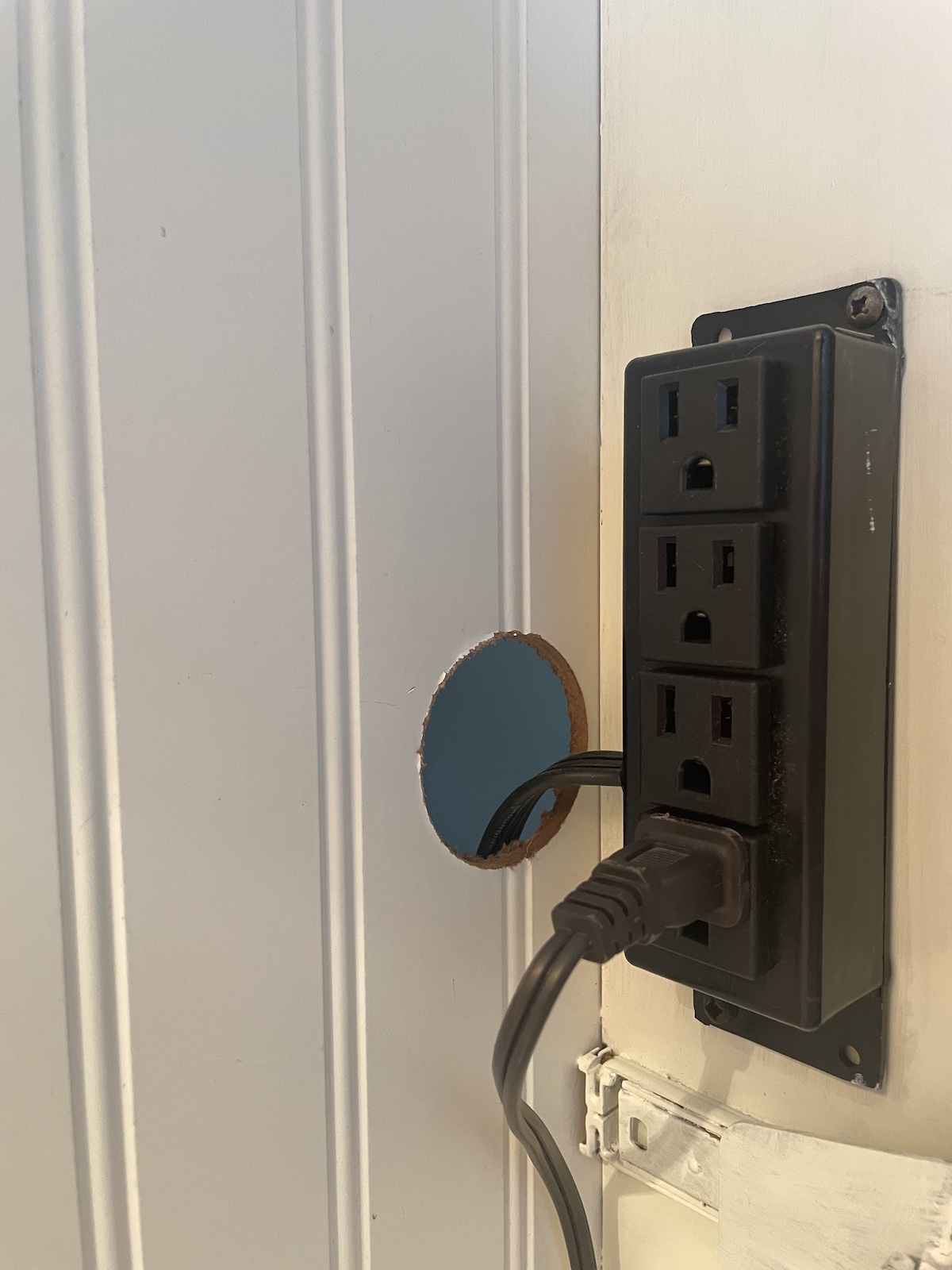 Sewing Space in Tight Quarters Tutorial: Upcycled TV Cabinet Power Strip