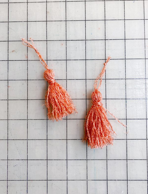 sew-a-patchwork-table-runner-on-an-overlocker - tassels