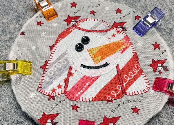 Clip three layers together before stitching