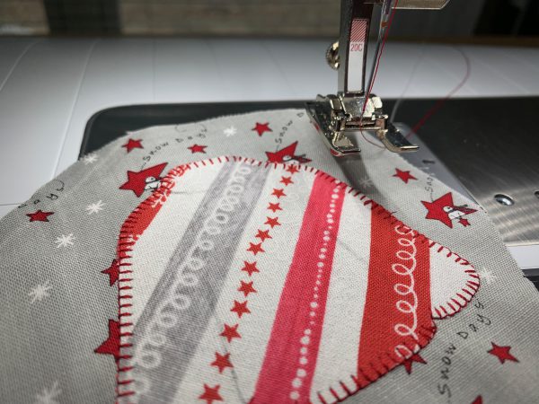 blanket stitch around the sweater