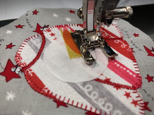 Satin stitch snowman smile
