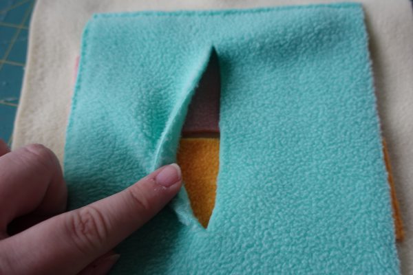 bernina we all sew sew your own snuffle mat part 2 cut 3 slits into the square