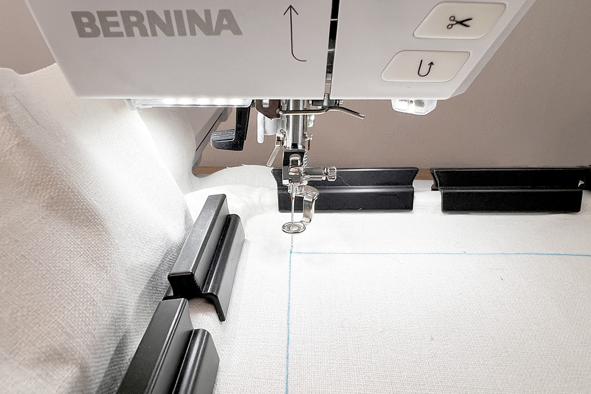 Kaffe_Cross_Stitch_Clamp_Hoop_15_Needle_Position_First_Point1_BERNINA_WeAllSew_Blog_1200x800px