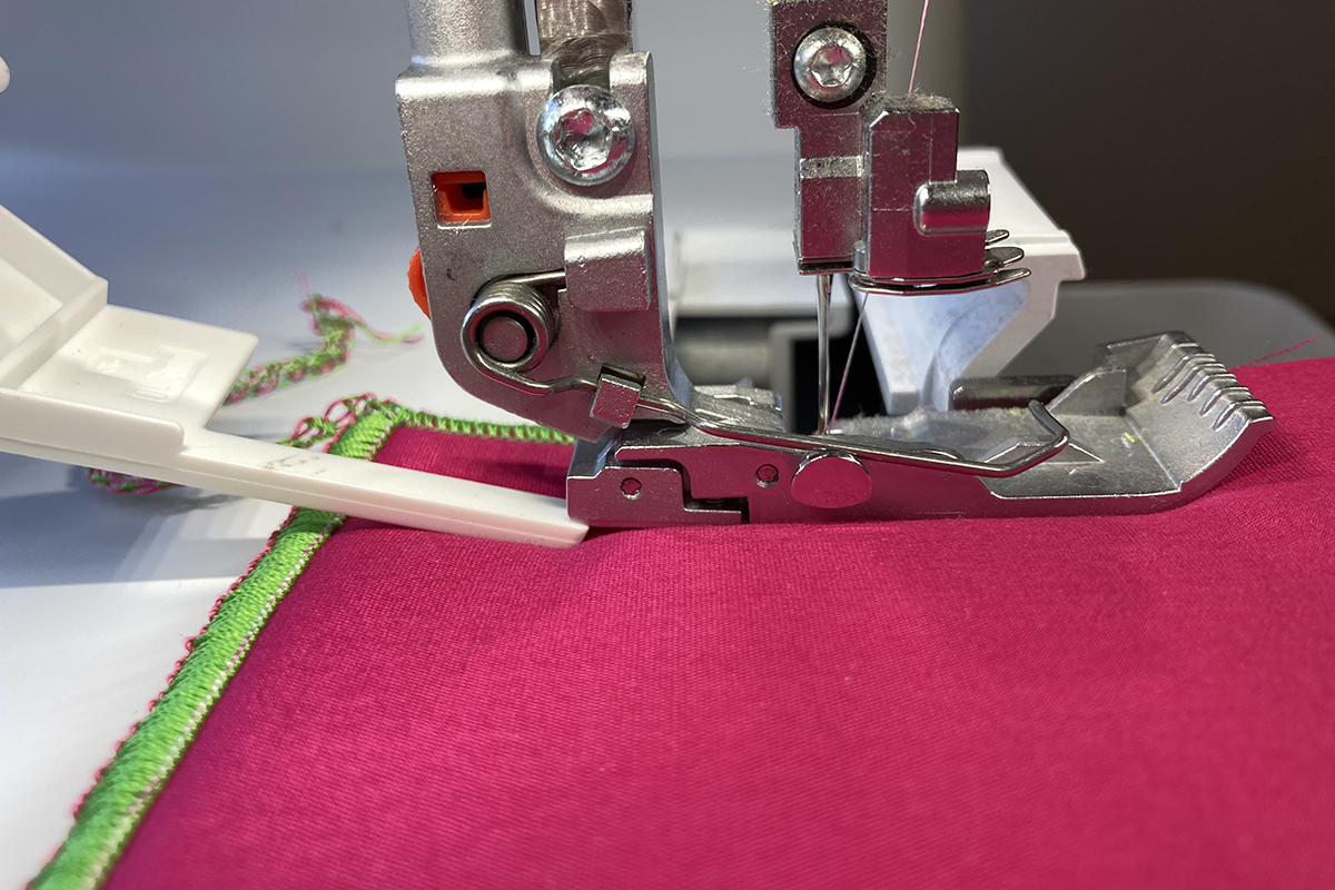 Overlocker_Height_Compensation_Tool_10_Tool_Out_from_under_Foot_HCT_BERNINA_WeAllSew_Blog_1200x800px