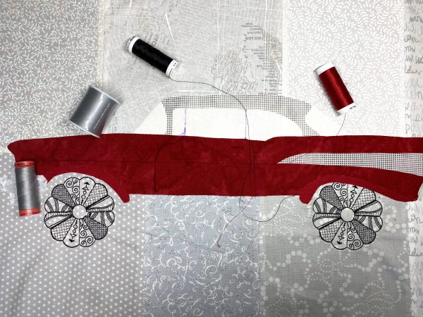 Thread selection for edge finishing applique is 40 weight polyester used for the glossy finish and ability to complement embroidery.