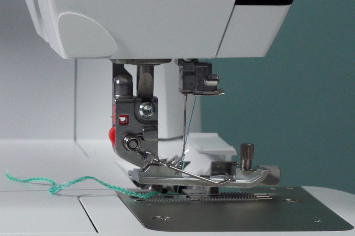 side view of an attached presser foot in the down position
